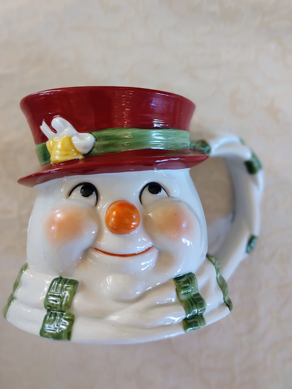 Holiday Ceramic Snowman Mug in White with Red Hat and Green Accents